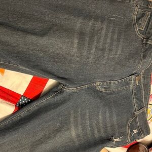 A pair of blue jeans not sure the size maybe a 14